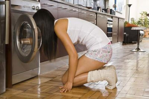 Máy giặt có mùi hôi phải làm sao ?